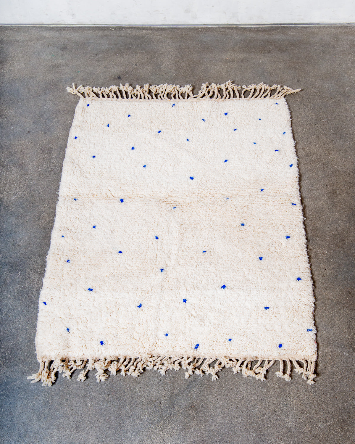 Modern, designer, handcrafted Berber rug from Morocco. Beniourain carpet with beautiful colours and patterns and fluffy wool texture.